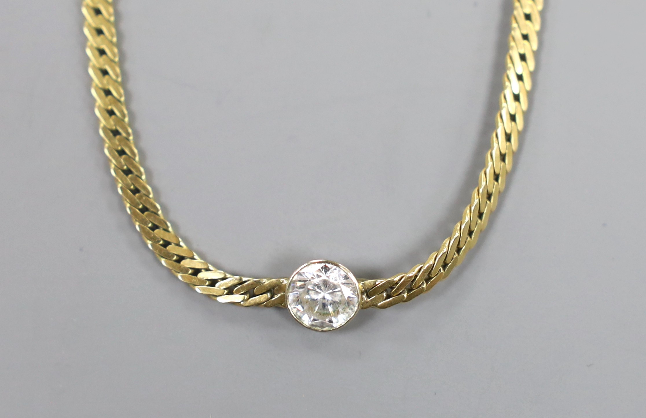 A modern Italian 585 chain, set with simulated diamond, 43cm, gross weight 13.6 grams.